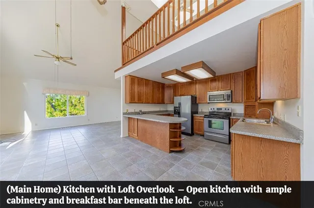 a utility room with sink dryer and washer