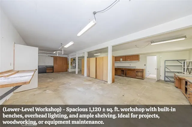 a bathroom with a granite countertop sink mirror vanity and toilet