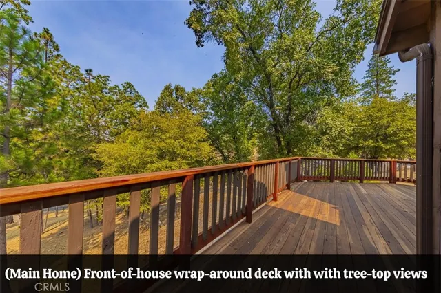 a view of balcony with wooden floor