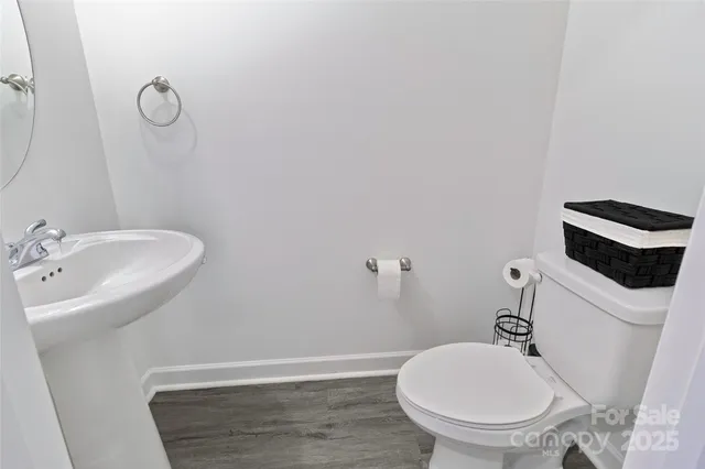 a bathroom with a toilet and a sink