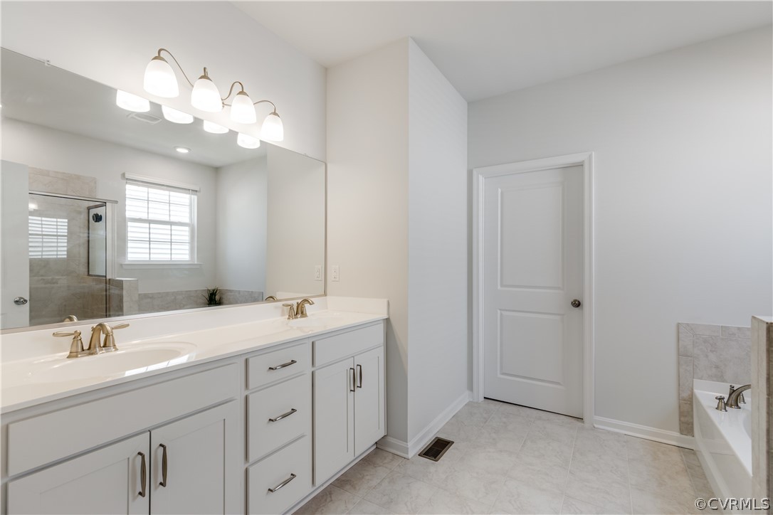 5649 Rohan Place Moseley, VA 23120 - Photo 27 of 48 LUXURY PRIMARY BATHROOM SUITE with TANKLESS WATER