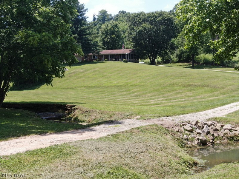 53310 Mud Run Road Senecaville, OH 43780 - Photo 23 of 28 Driveway, property and stream