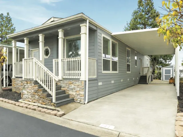 a front view of a house with a porch