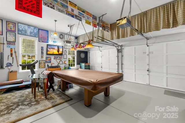 a room with lots of tables and chairs