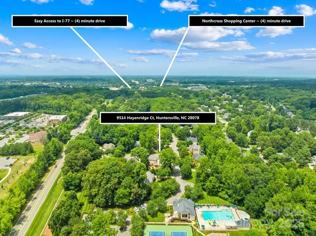 a view of a back yard of the house and green space