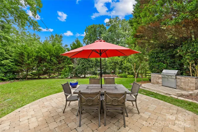 a view of backyard with seating space