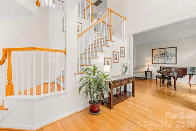 a kitchen with stainless steel appliances a refrigerator sink and microwave