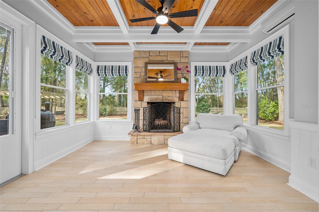 4524 Southwest 105th Drive Gainesville, FL 32608 - Photo 24 of 56 a living room with furniture and a fireplace