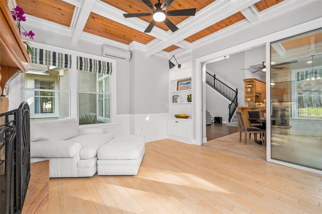 4524 Southwest 105th Drive Gainesville, FL 32608 - Photo 25 of 56 a bedroom with furniture and a large window