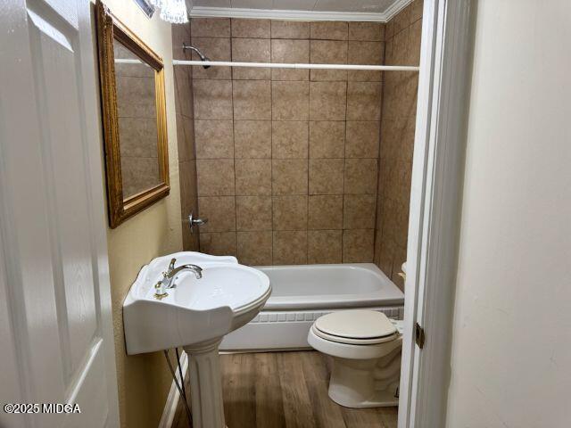 4912 Old Gordon Road Dry Branch, GA 31020 - Photo 16 of 32 a bathroom with a sink toilet and shower