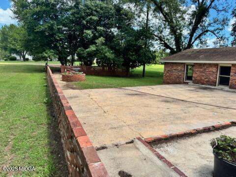 4912 Old Gordon Road Dry Branch, GA 31020 - Photo 21 of 32 a view of a house with a yard