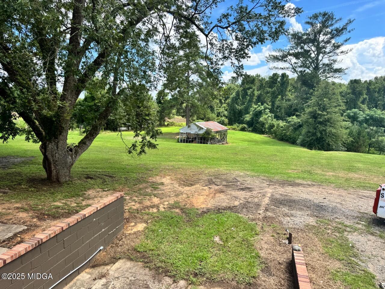4912 Old Gordon Road Dry Branch, GA 31020 - Photo 32 of 32 a view of a park with large trees
