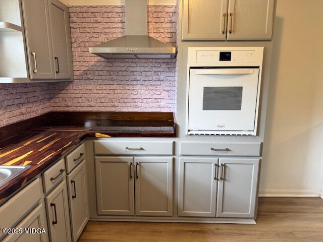 4912 Old Gordon Road Dry Branch, GA 31020 - Photo 7 of 32 a kitchen with stainless steel appliances granite countertop a stove and a microwave