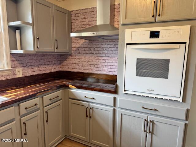4912 Old Gordon Road Dry Branch, GA 31020 - Photo 8 of 32 a kitchen with granite countertop white cabinets and white appliances