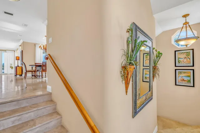 a kitchen with granite countertop cabinets stainless steel appliances and a counter space