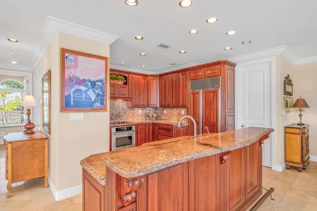 a living room with furniture ceiling fan and a rug