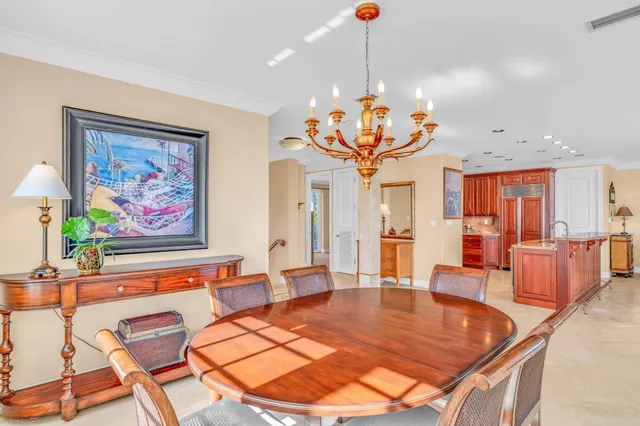 a view of a dining room with furniture and outdoor view