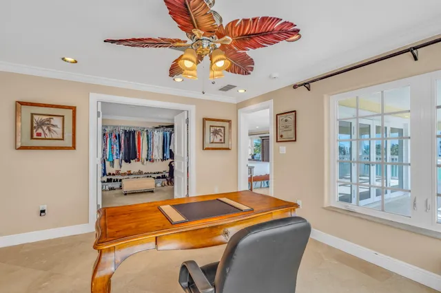 a view of a swimming pool with a patio