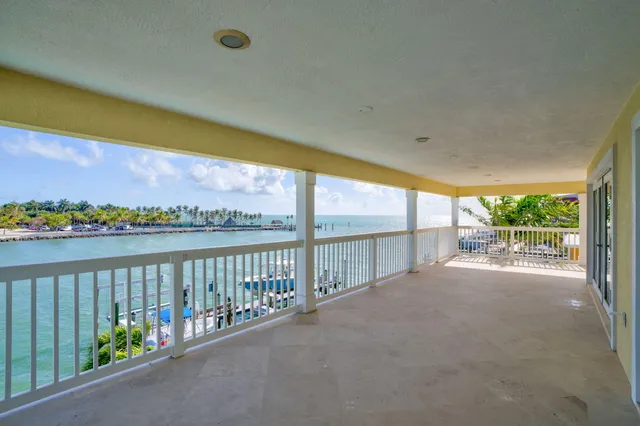 a view of a swimming pool with an outdoor space and seating area