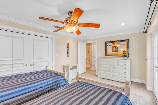 a aerial view of a house with a garden and swimming pool