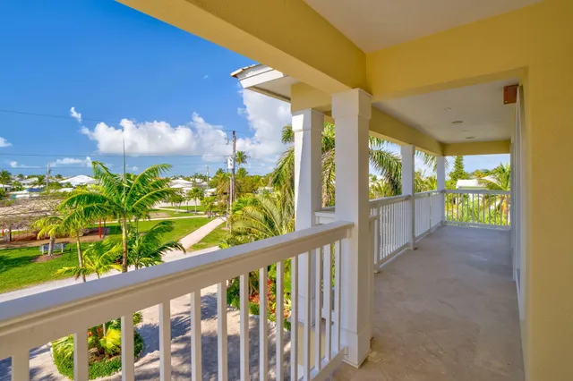 a table and chairs in front of a building