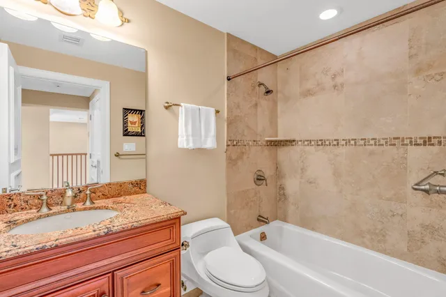 a front view of a house with a big yard