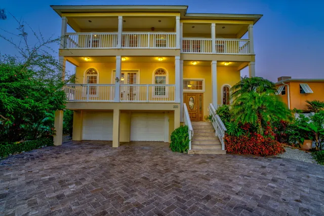 a view of a brick house with a entryway