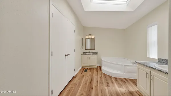 a bathroom with a sink and a bathtub
