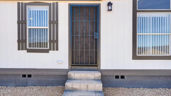 a view of a terrace with a lake view