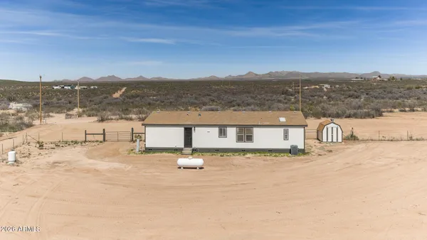 a view of a road from a yard