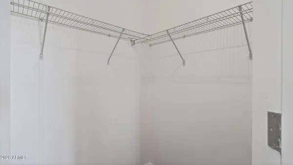 a view of cabinets and washer dryer