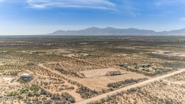 a view of an ocean and mountain