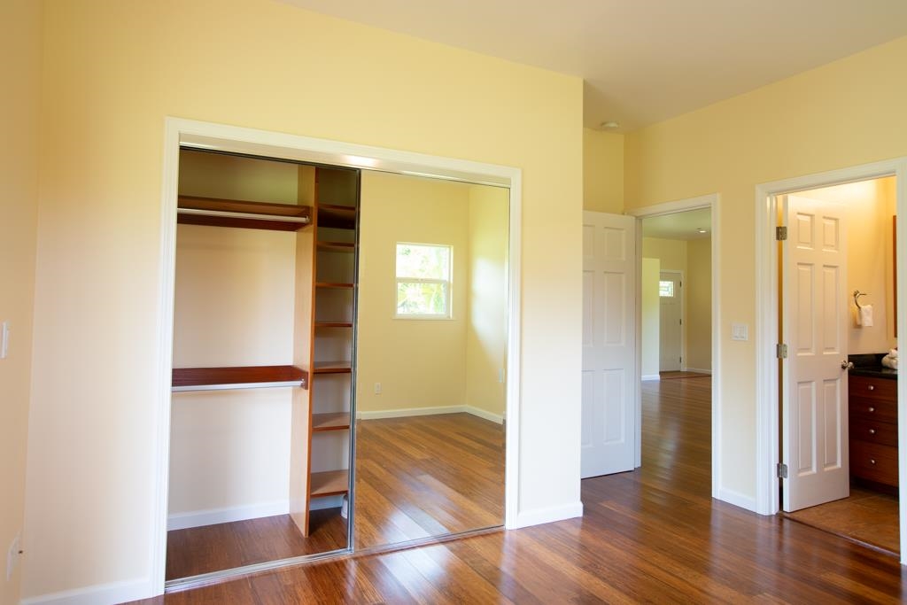 60 Nohea Place, Unit B Haiku, HI 96708 - Photo 13 of 30 a view of empty room with wooden floor