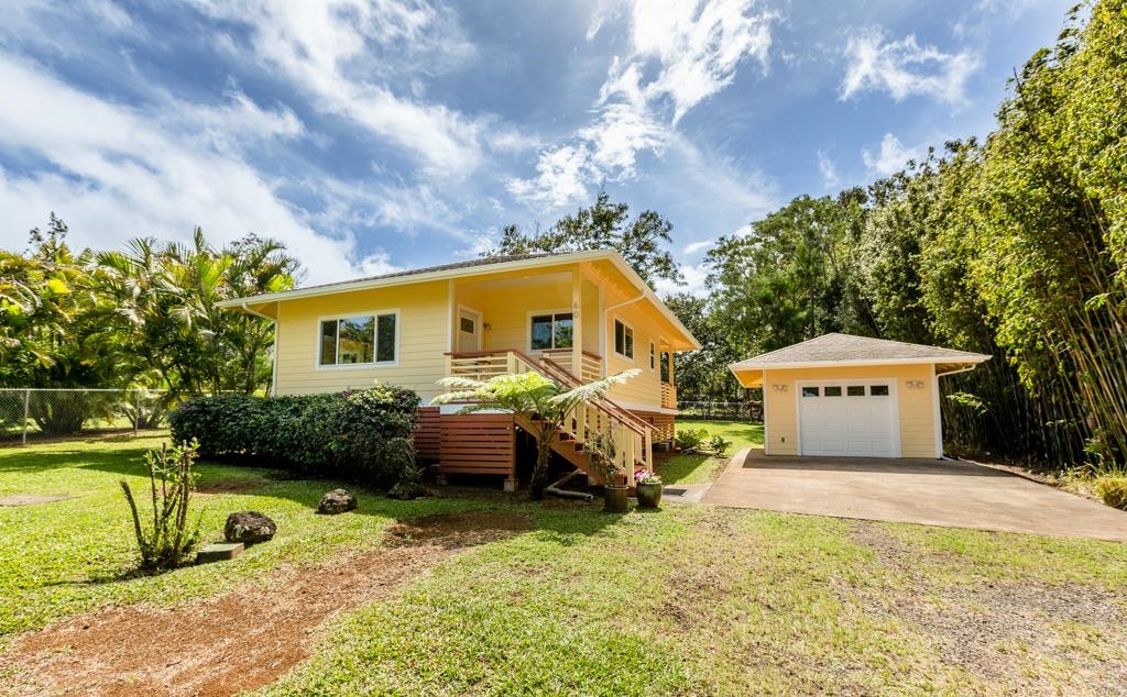 60 Nohea Place, Unit B Haiku, HI 96708 - Photo 2 of 30 a front view of a house with garden