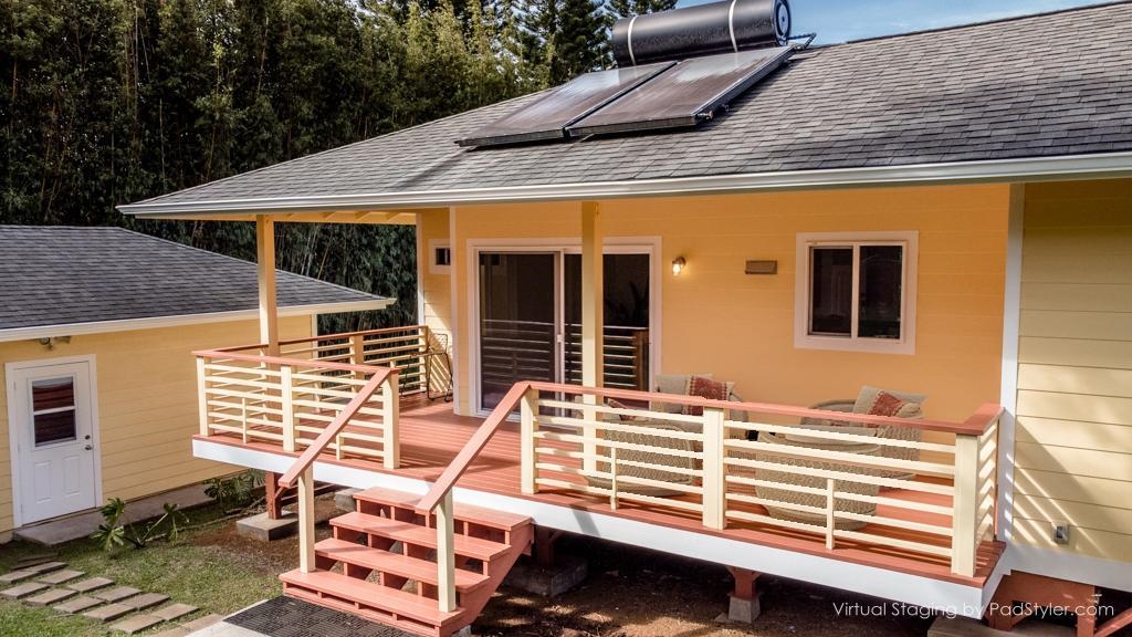 60 Nohea Place, Unit B Haiku, HI 96708 - Photo 22 of 30 a view of a patio with table and chairs with wooden floor and fence