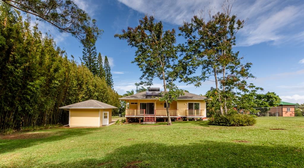 60 Nohea Place, Unit B Haiku, HI 96708 - Photo 26 of 30 a front view of a house with a garden