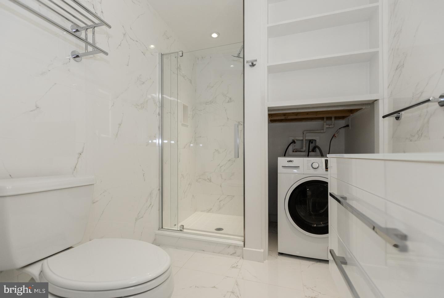 1602 Sansom Street, Unit 2 Philadelphia, PA 19103 - Photo 13 of 18 a bathroom with a toilet and a shower