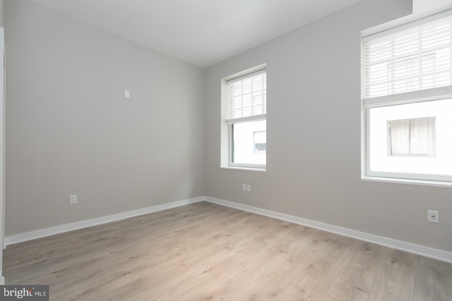 1602 Sansom Street, Unit 2 Philadelphia, PA 19103 - Photo 9 of 18 an empty room with a window