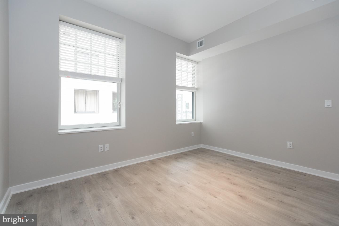 1602 Sansom Street, Unit 2 Philadelphia, PA 19103 - Photo 10 of 18 an empty room with a window