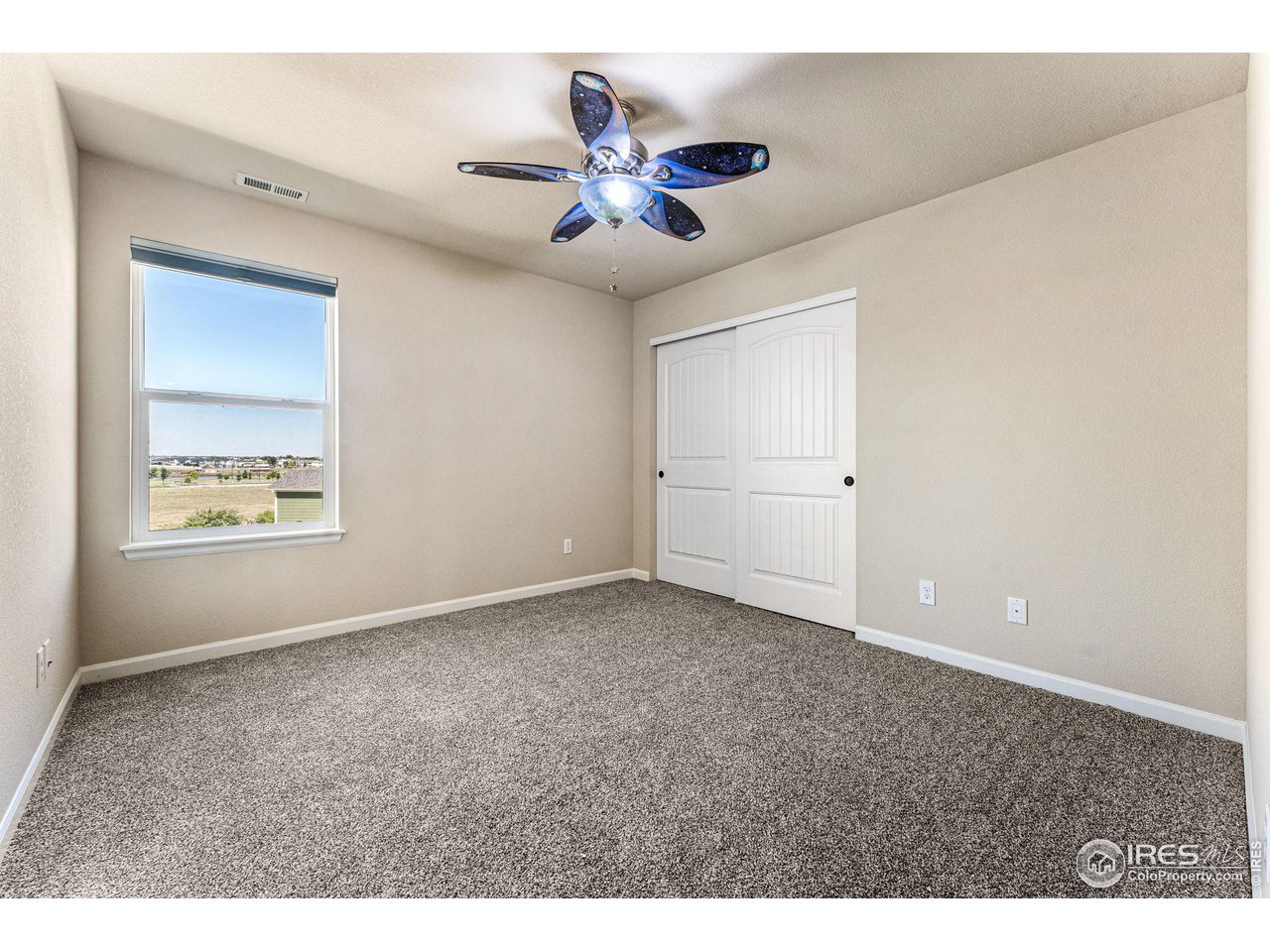 5101 Eagan Circle Longmont, CO 80503 - Photo 25 of 39 a view of an empty room and window