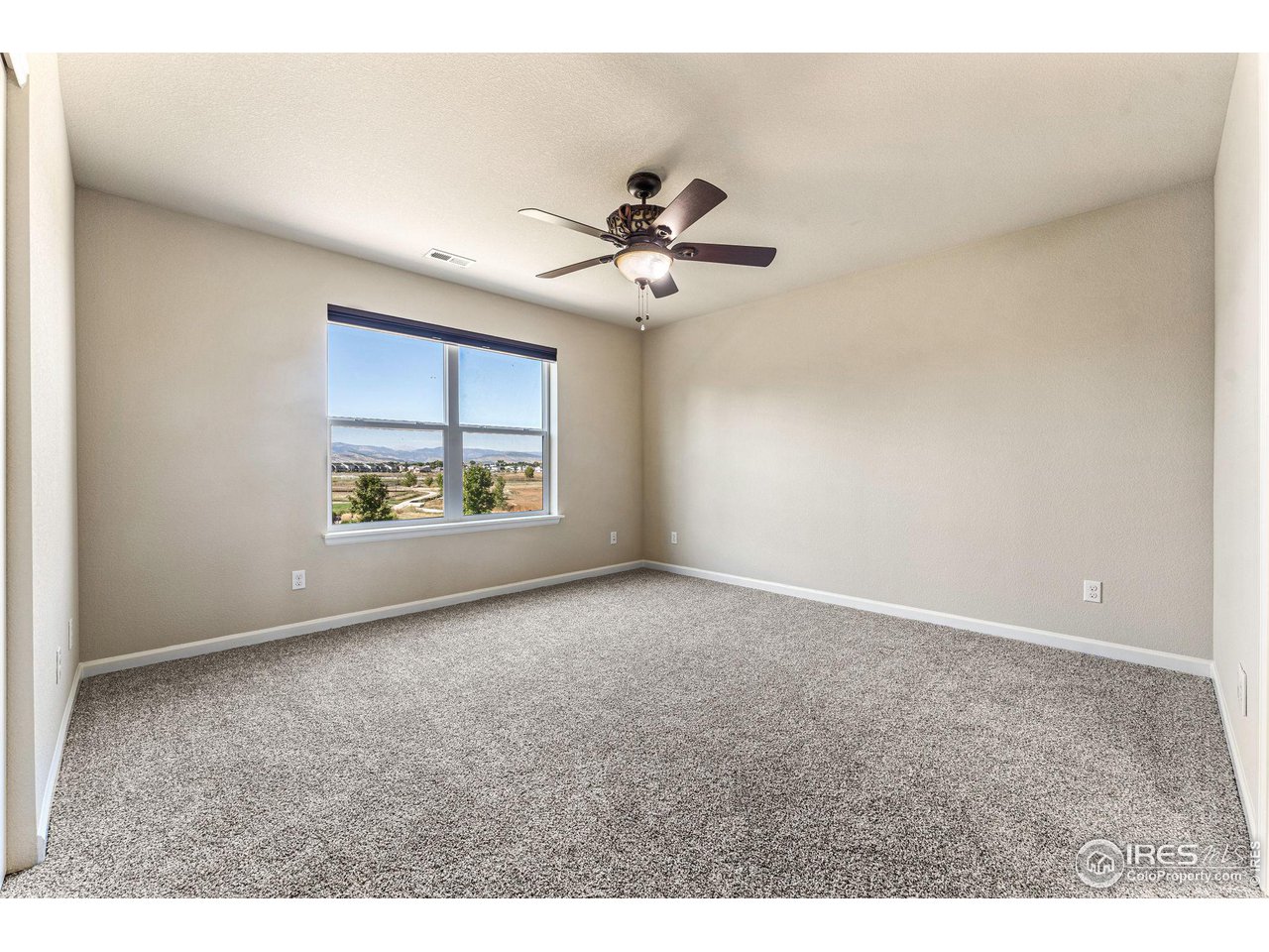 5101 Eagan Circle Longmont, CO 80503 - Photo 26 of 39 a view of an empty room with a window