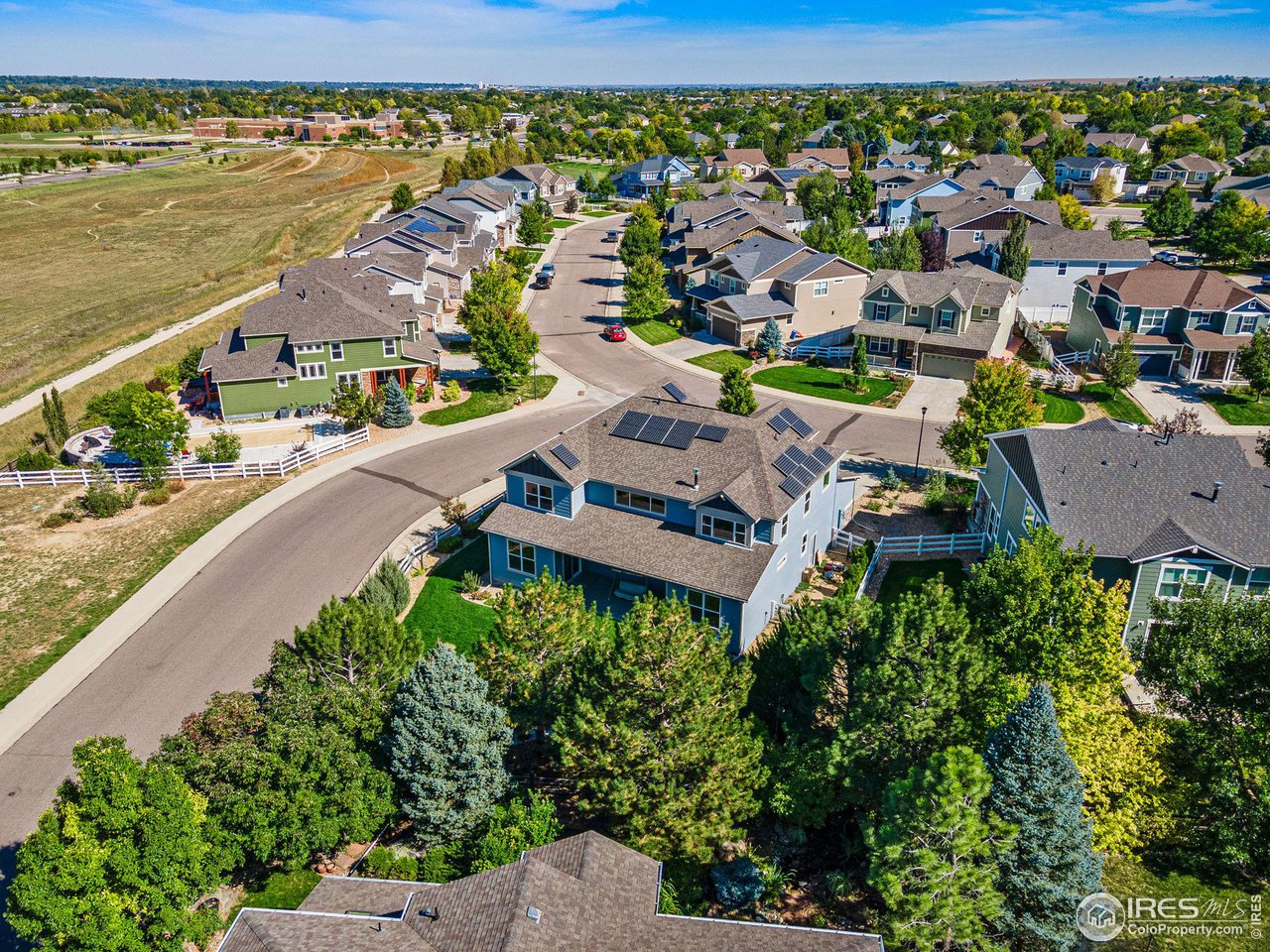 5101 Eagan Circle Longmont, CO 80503 - Photo 37 of 39 an aerial view of residential houses with outdoor space