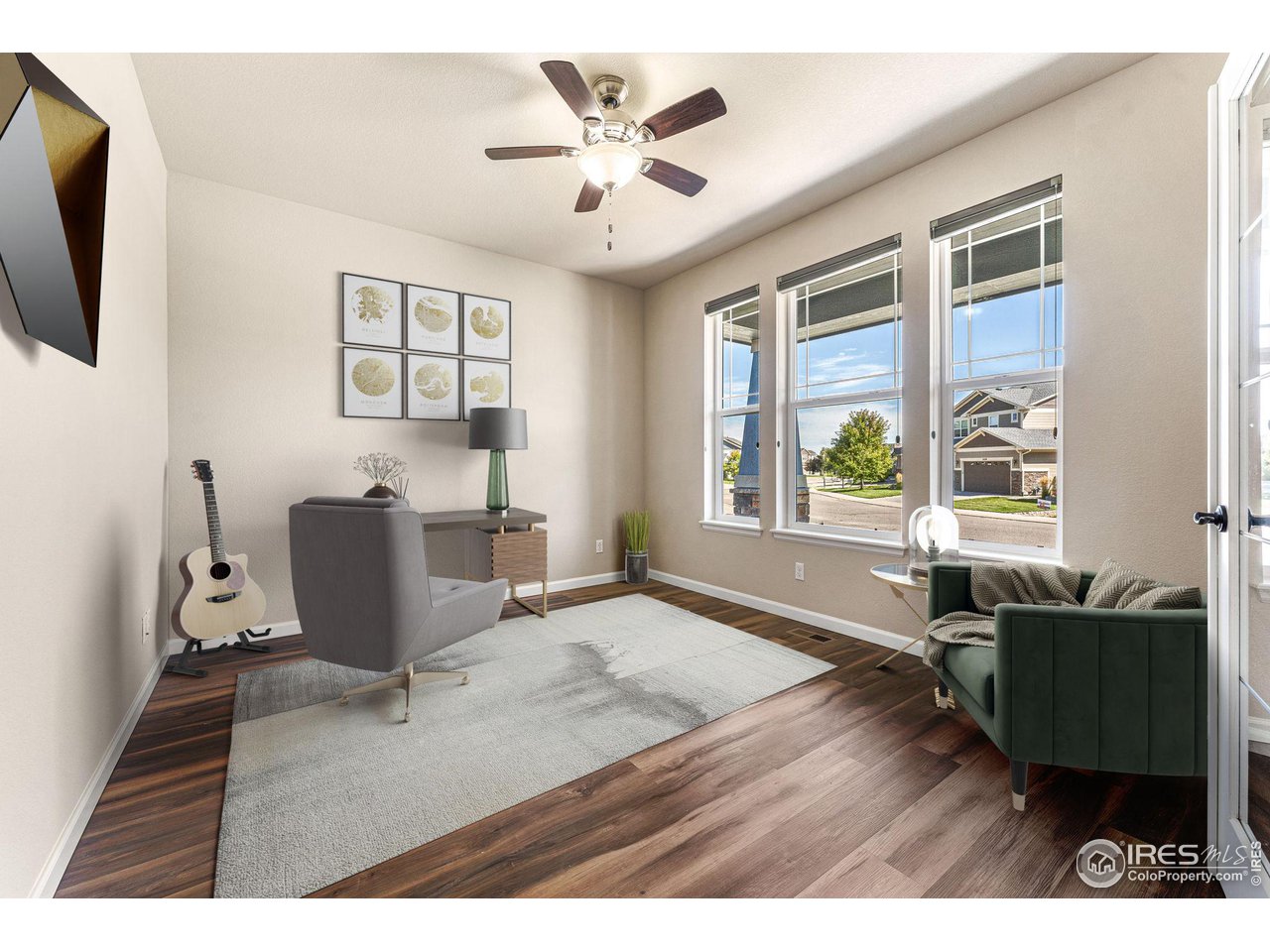 5101 Eagan Circle Longmont, CO 80503 - Photo 4 of 39 a living room with furniture and a window