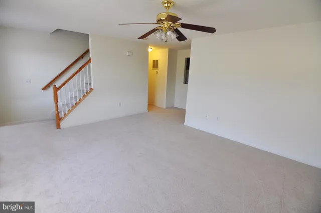 a view of an entryway with a hallway