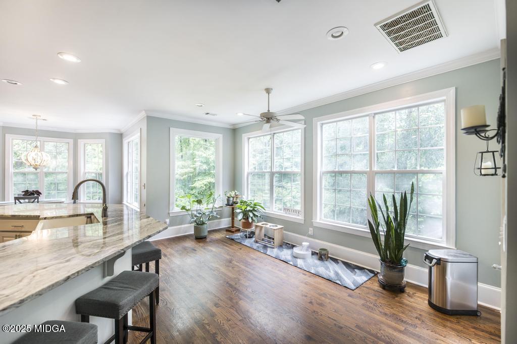2489 Boxankle Road Forsyth, GA 31029 - Photo 13 of 68 a living room with furniture large window and wooden floor