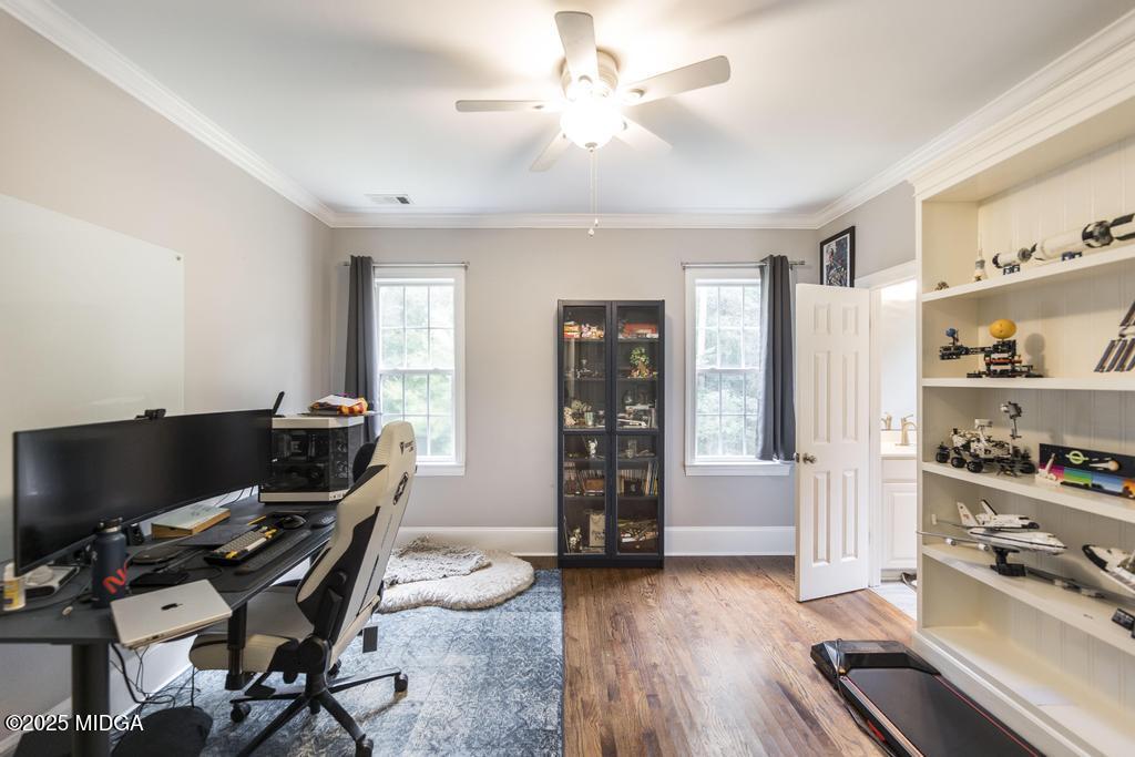 2489 Boxankle Road Forsyth, GA 31029 - Photo 27 of 68 a view of a workspace with furniture and a window