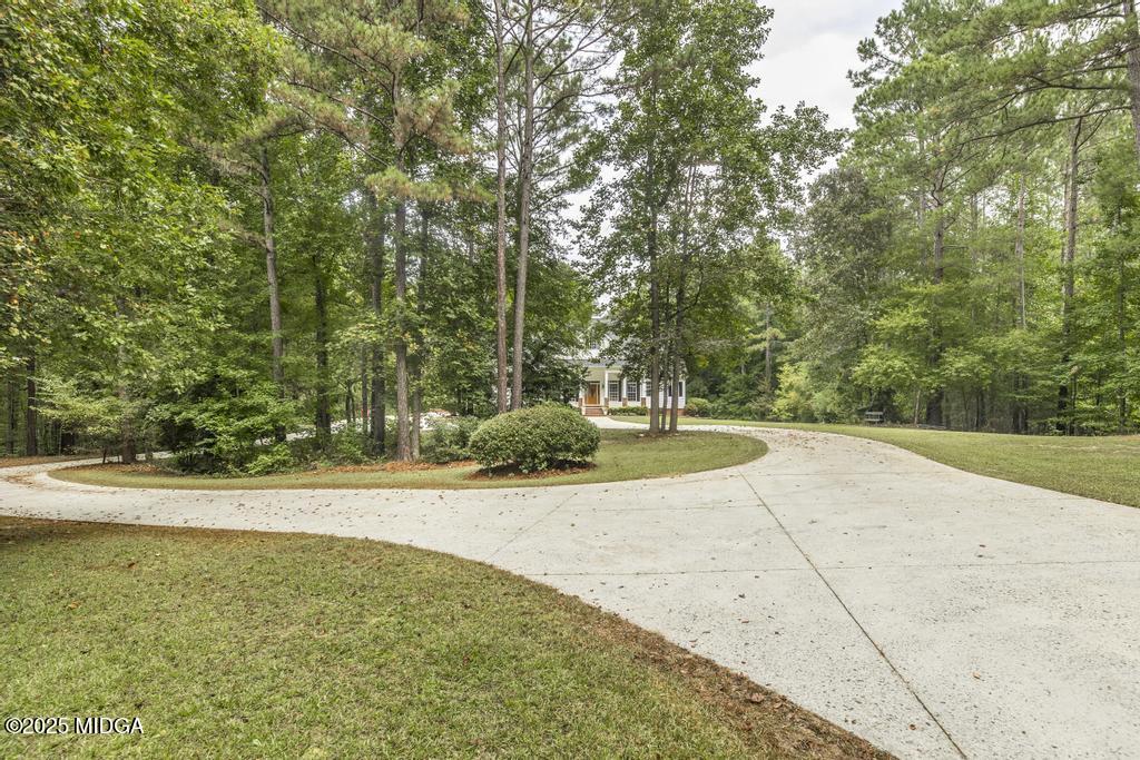 2489 Boxankle Road Forsyth, GA 31029 - Photo 5 of 68 a view of a garden with basketball court