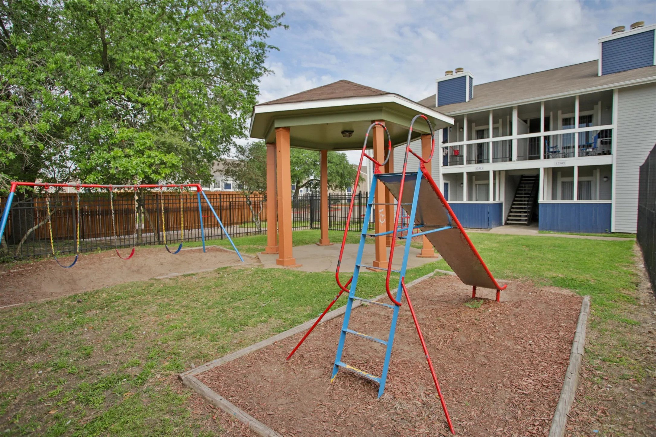 2700 South Dairy Ashford Road, Unit 610D Houston, TX 77082 - Photo 7 of 15 a view of a house with a backyard