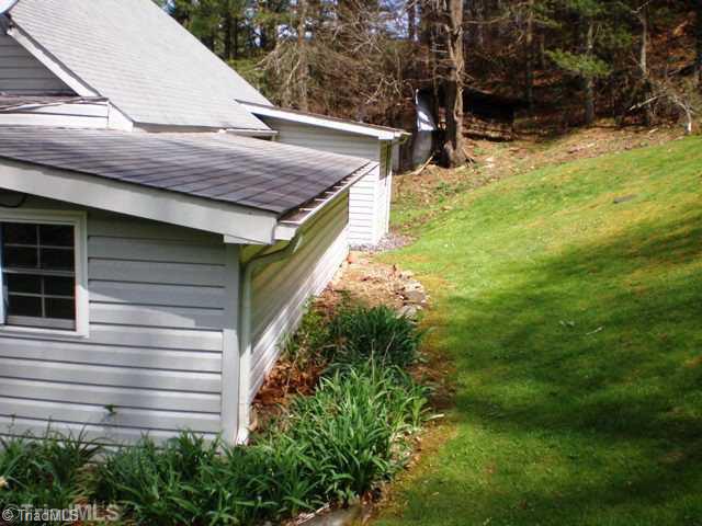 235 Howell Road Lansing, NC 28643 - Photo 3 of 16 Exterior Back.