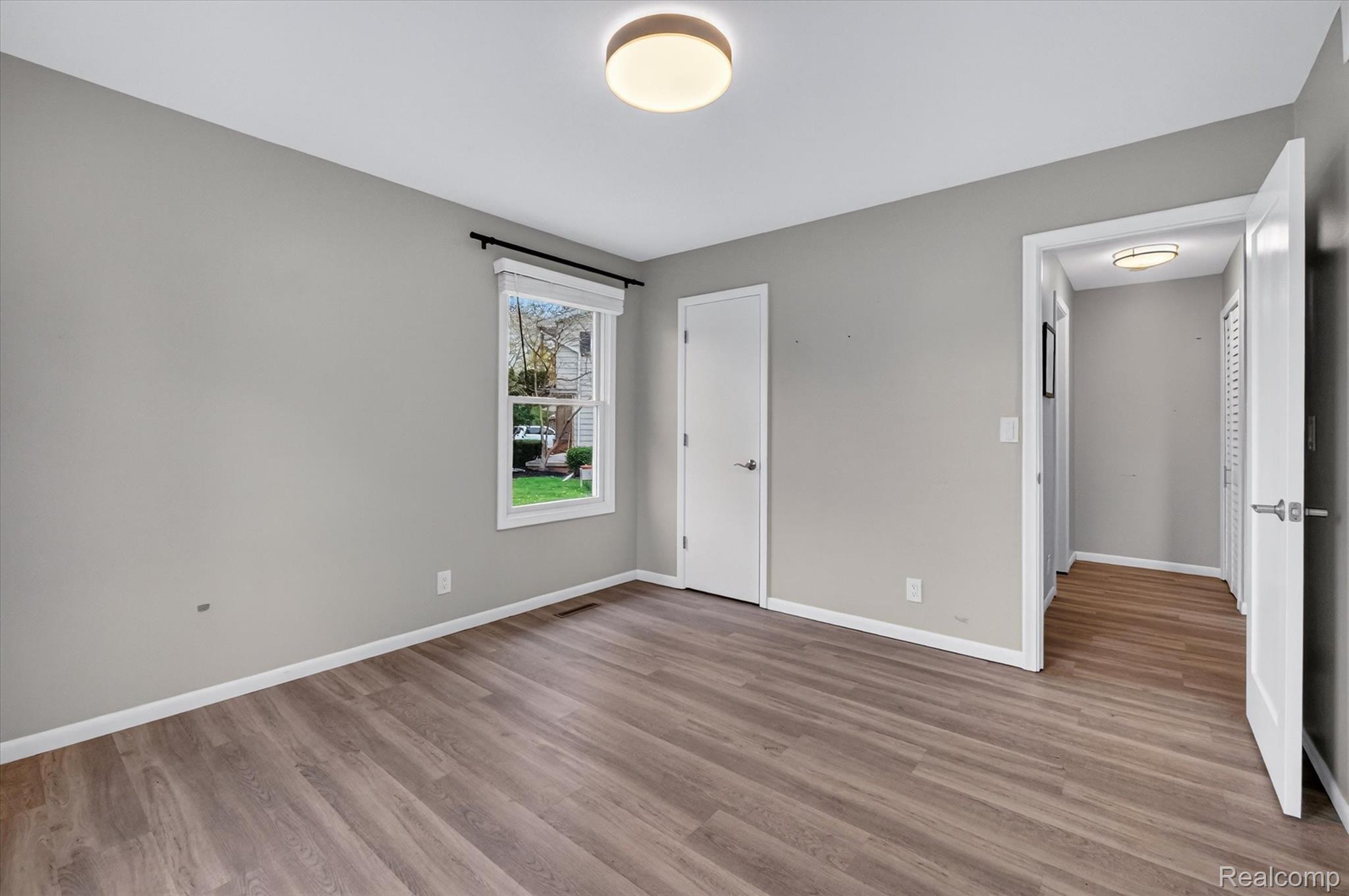 2264 Crane Road Fenton, MI 48430 - Photo 36 of 55 Unfurnished bedroom with light wood-type flooring